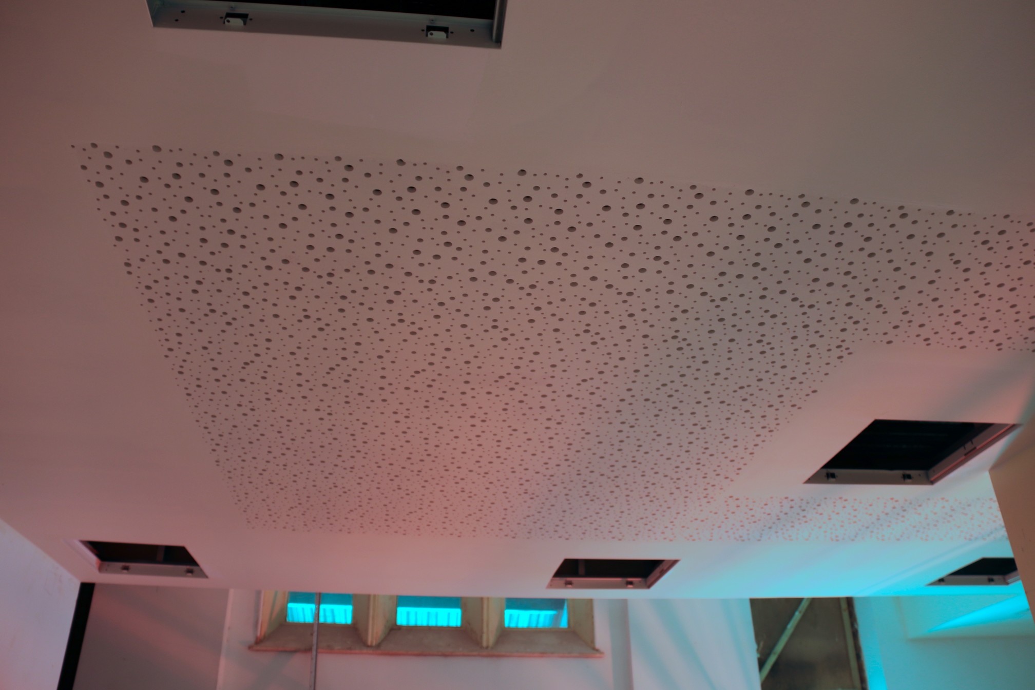 The ceiling in the Gateway Lodge dining area is installed, with acoustic treatment to make the room less echoey.
